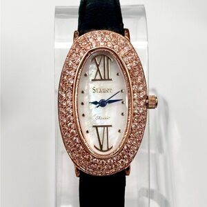 Stauer rose gold tone watch, 22mm size case, 7in size band.